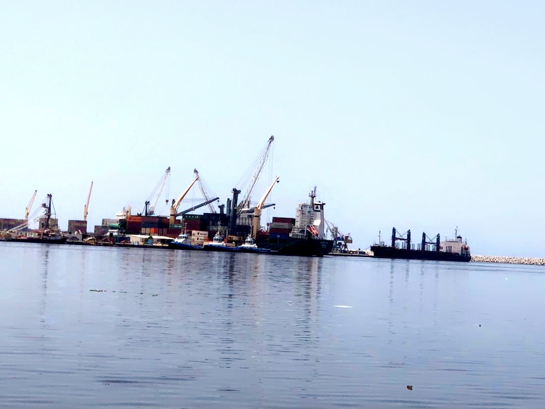 Container cranes and cargo ships at the Port of Benghazi